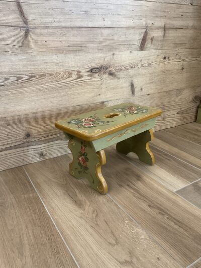 Decorated footrest stool